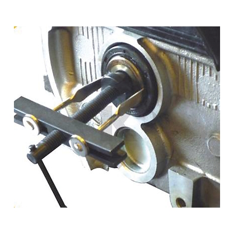 Werkzeug zur Entfernung eines Öldichtrings in einem Motorblock.